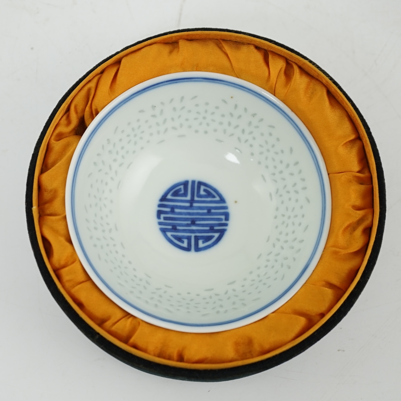 A Chinese blue and white ‘rice grain’ bowl, Jiaqing mark and possibly of the period
